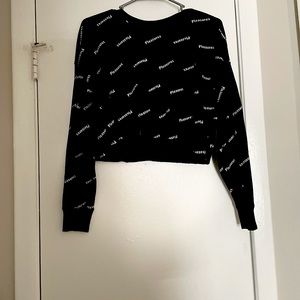 Black “pleasures” crop top
